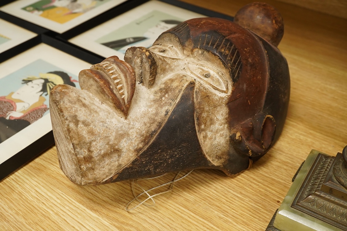African tribal art interest; a Democratic Republic of Congo carved and painted mask, 36cm